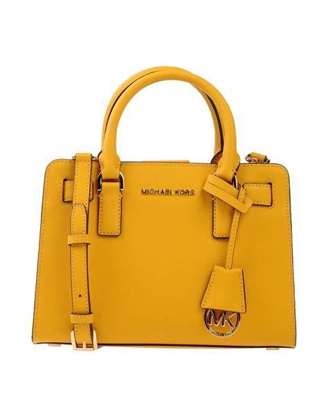 yellow purse michael kors|yellow michael kors backpack.